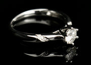 .75c silver Moissanite ring