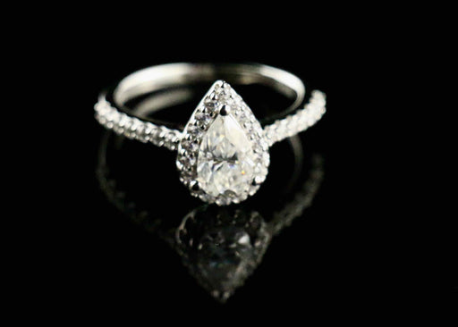 1.0Ct Pear Cut Moissanite Engagement Ring Set In Sterling Silver