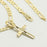 Figaro chain with gold indented cross charm