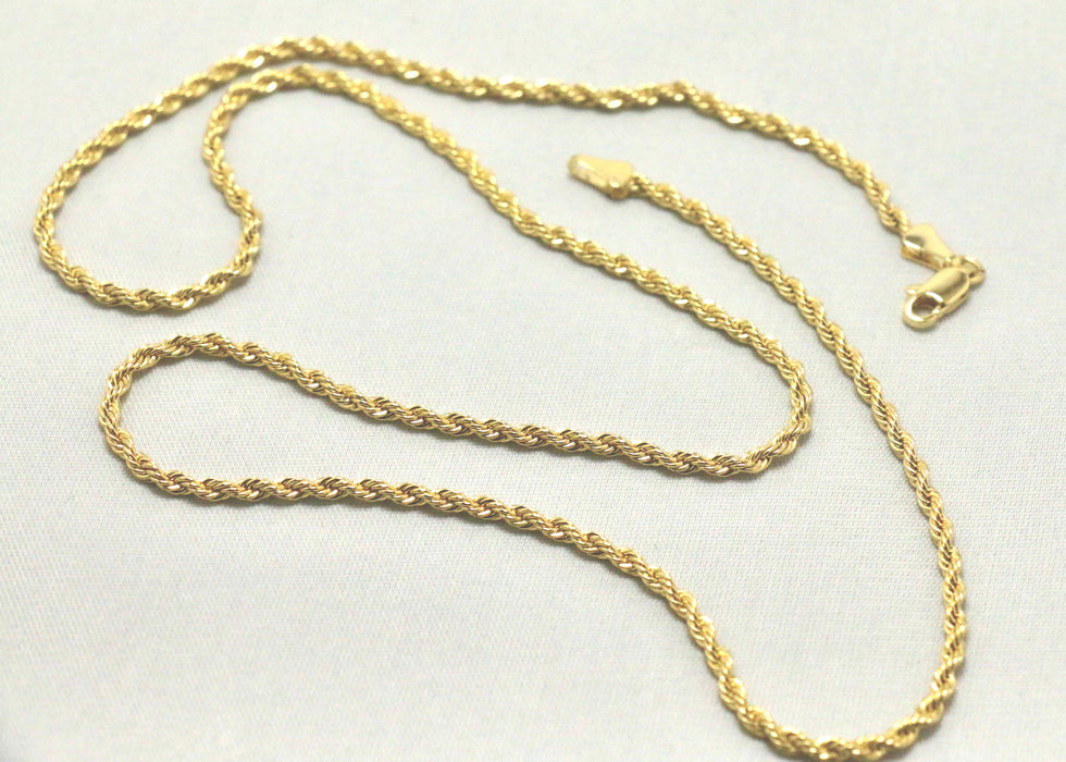 Rope chain with gold indented cross charm