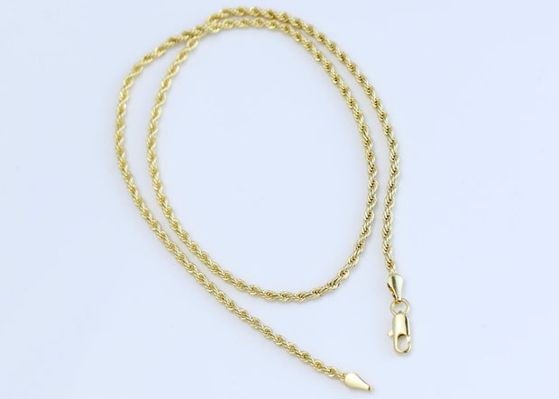 Rope chain with small diamond cross