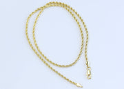 Rope chain with small diamond studded cross charm